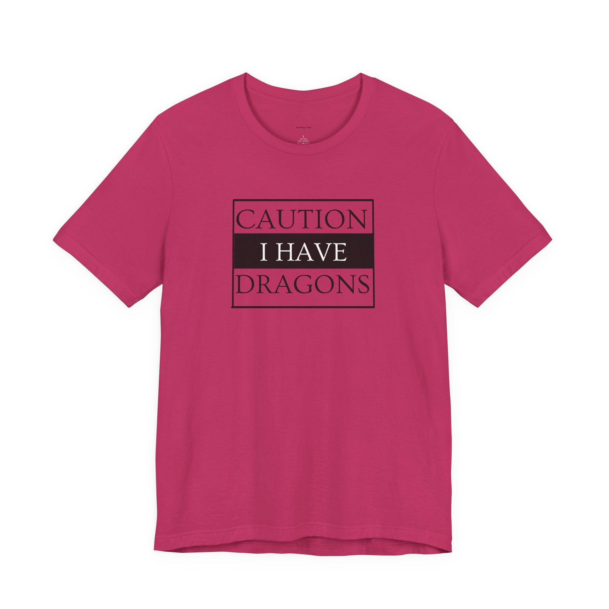 Pink t-shirt with 'Caution I Have Dragons' text