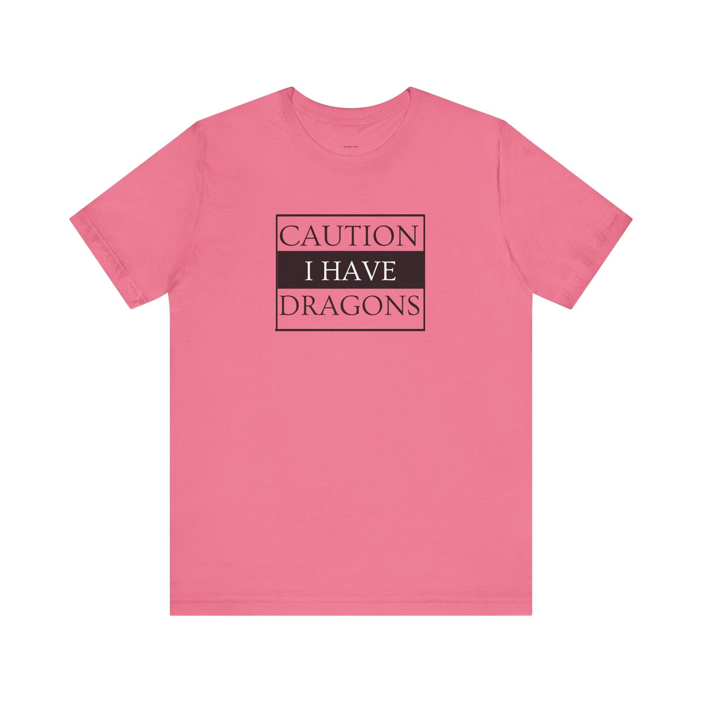 Pink t-shirt with 'Caution I Have Dragons' text