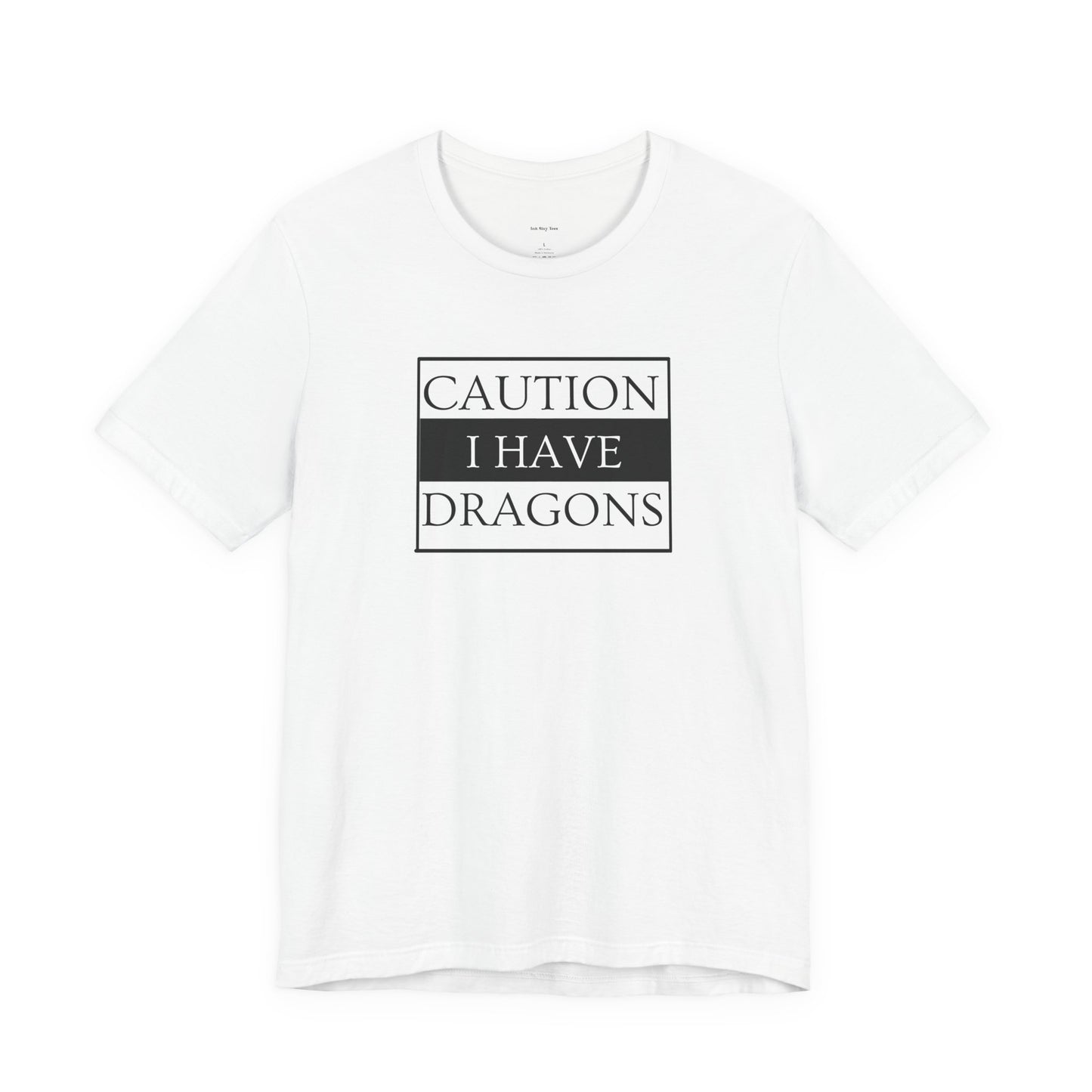White t-shirt with 'Caution I Have Dragons' text