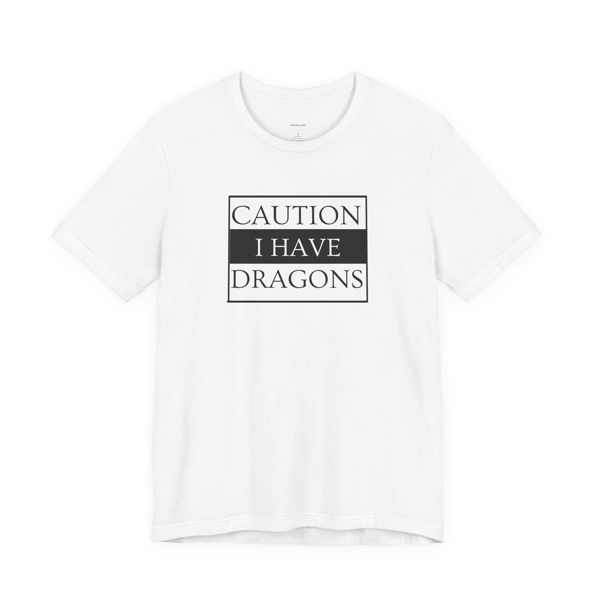 White t-shirt with 'Caution I Have Dragons' text
