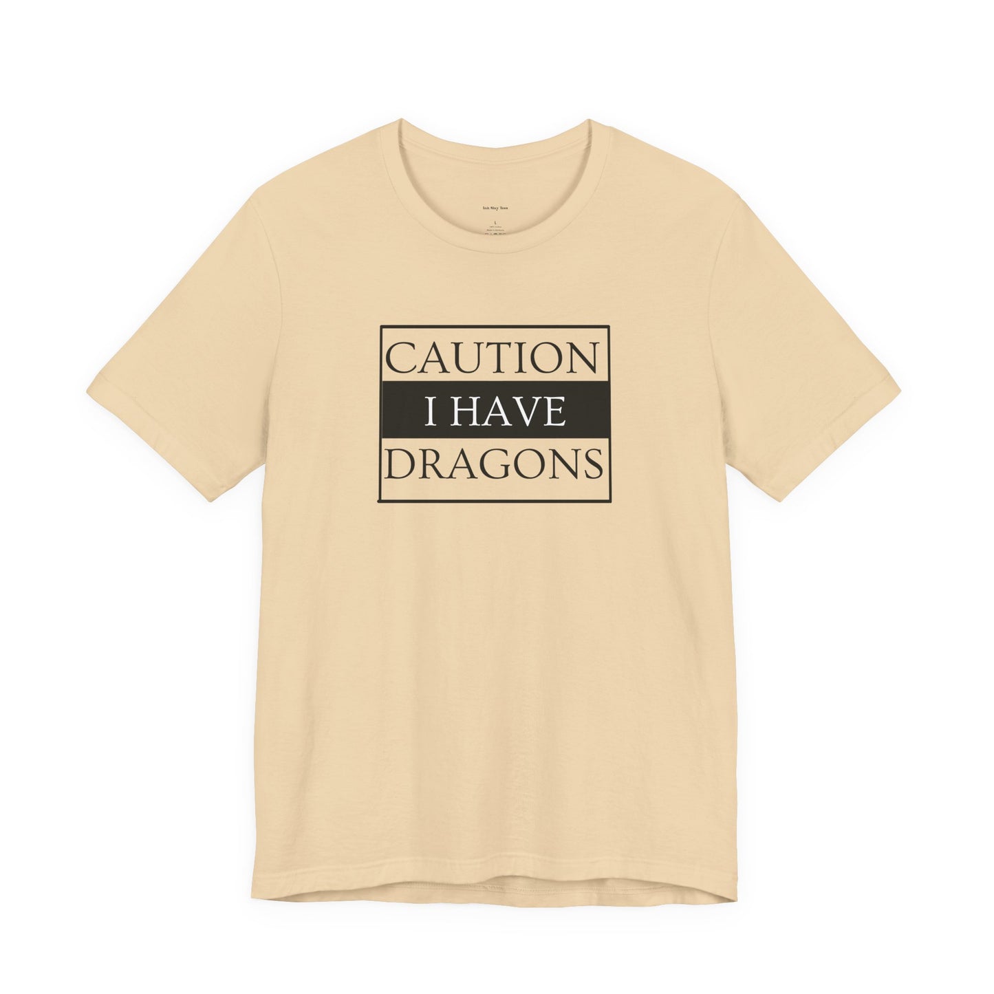 Beige t-shirt with 'Caution I Have Dragons' text