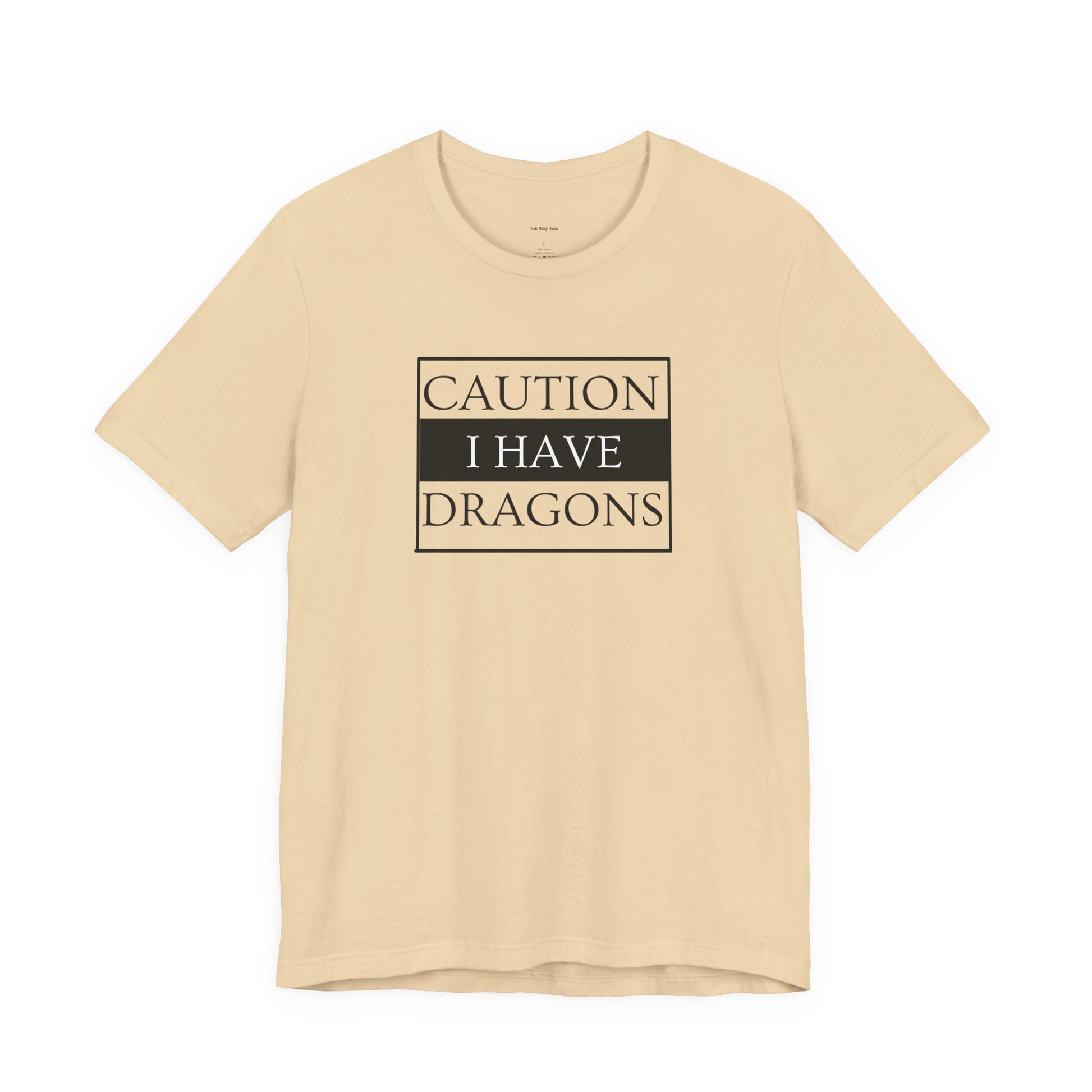 Beige t-shirt with 'Caution I Have Dragons' text