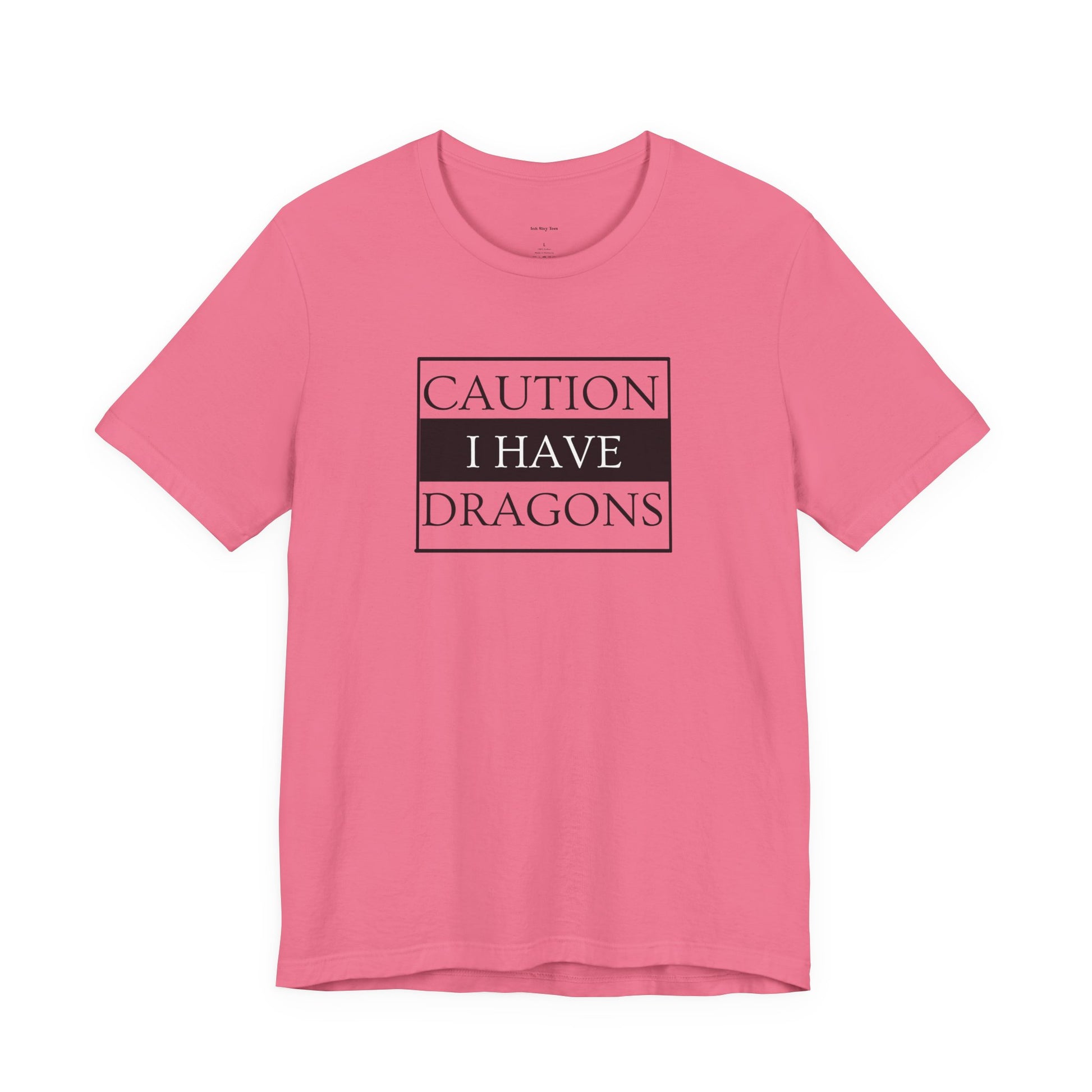 Pink t-shirt with 'Caution I Have Dragons' text