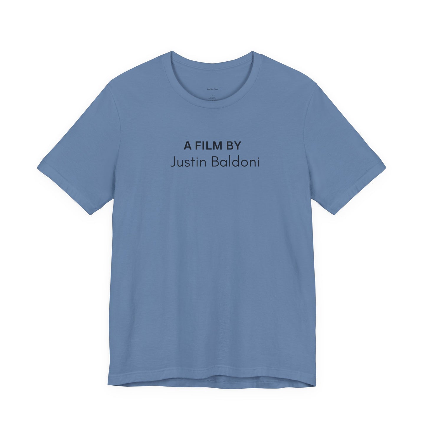 Blue t-shirt with 'A Film by Justin Baldoni' text