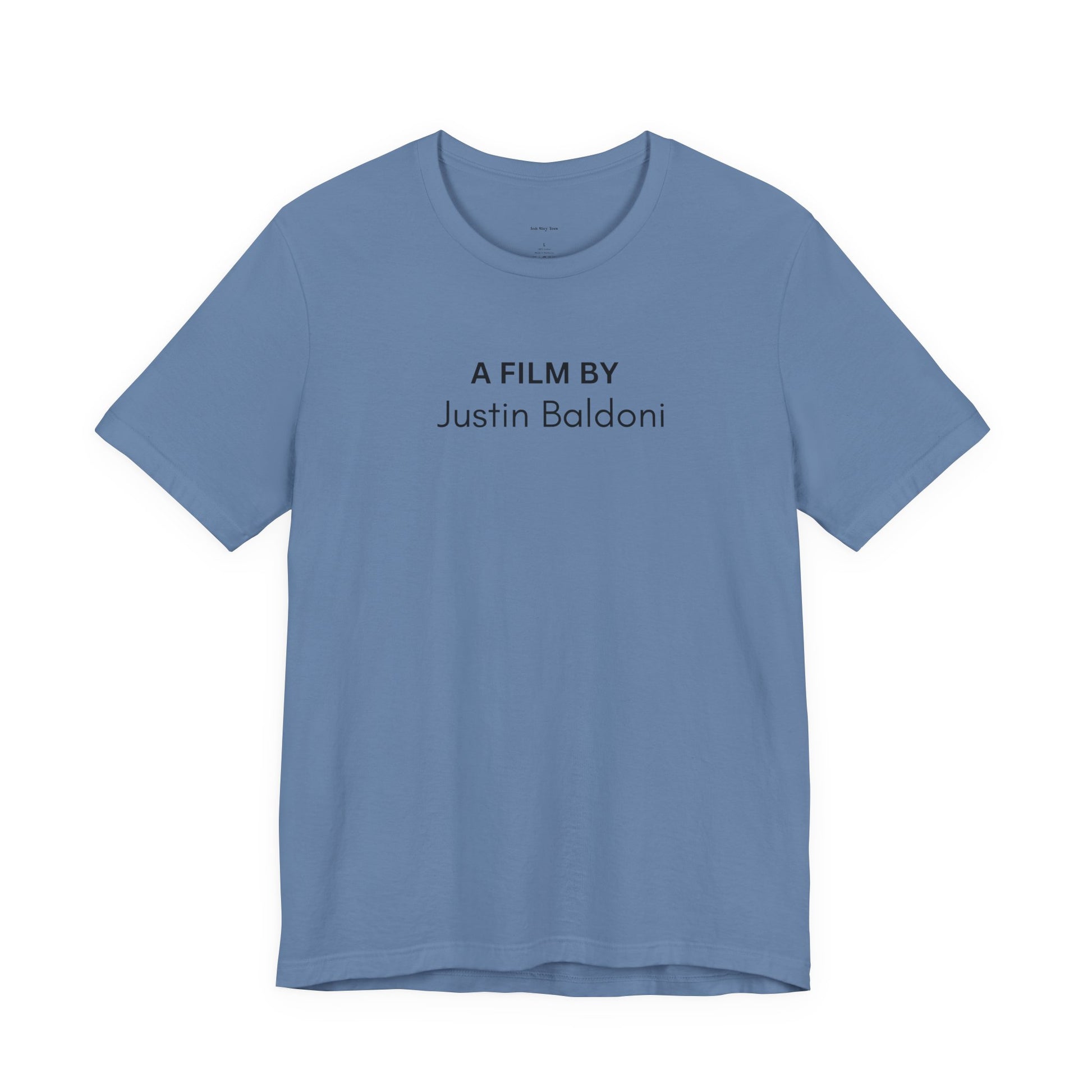 Blue t-shirt with 'A Film by Justin Baldoni' text