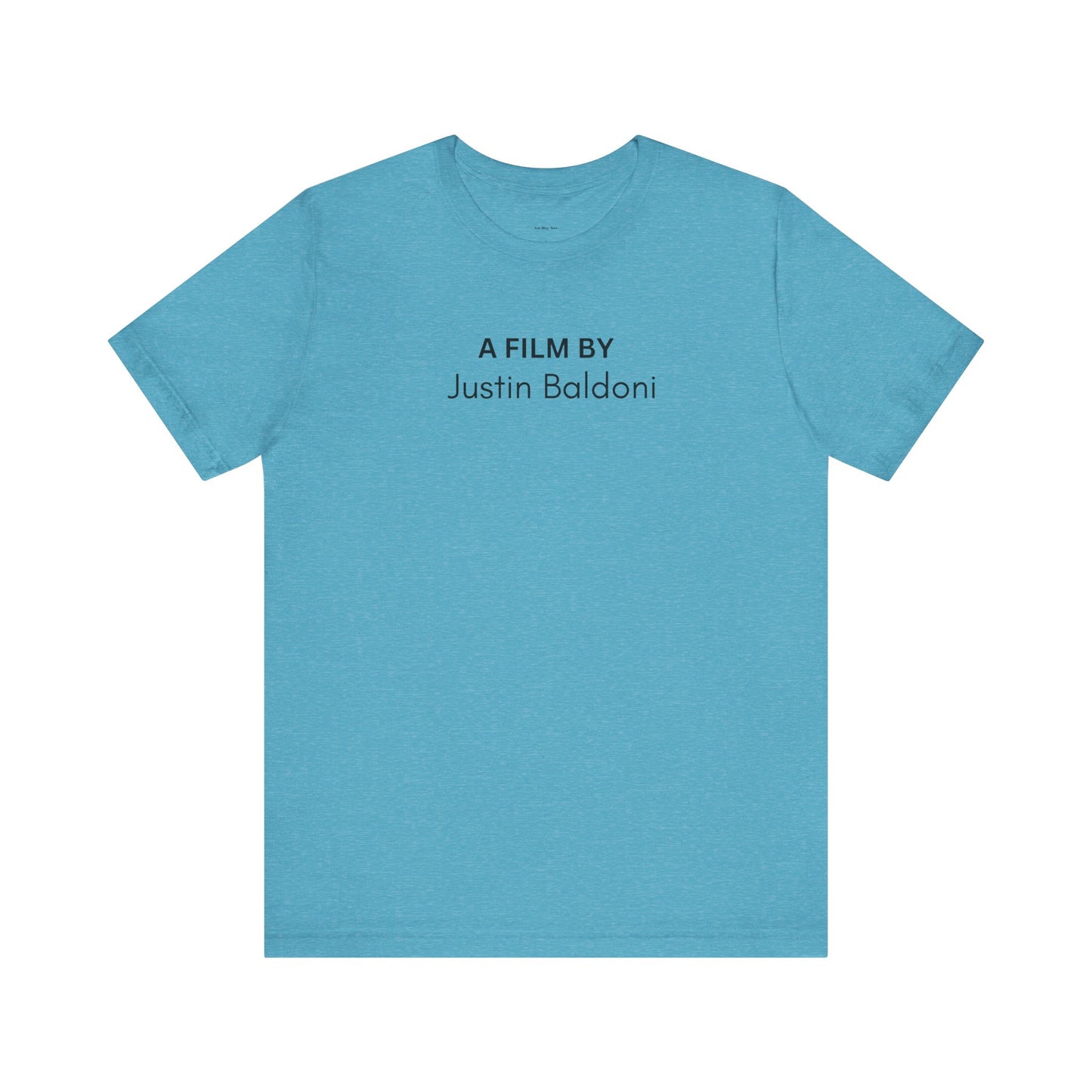Blue t-shirt with text 'A Film By Justin Baldoni' 