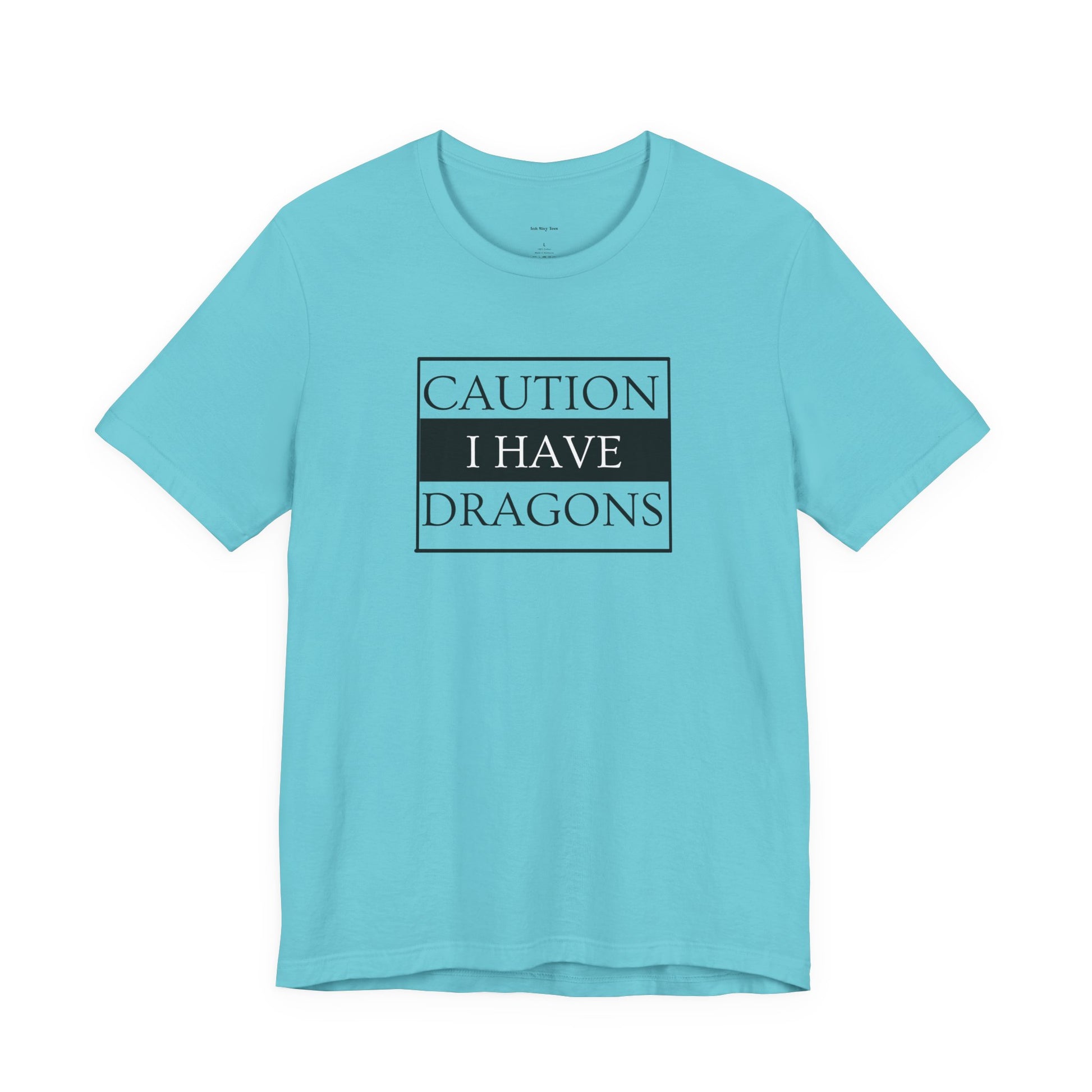 Light blue t-shirt with 'Caution I Have Dragons' text  