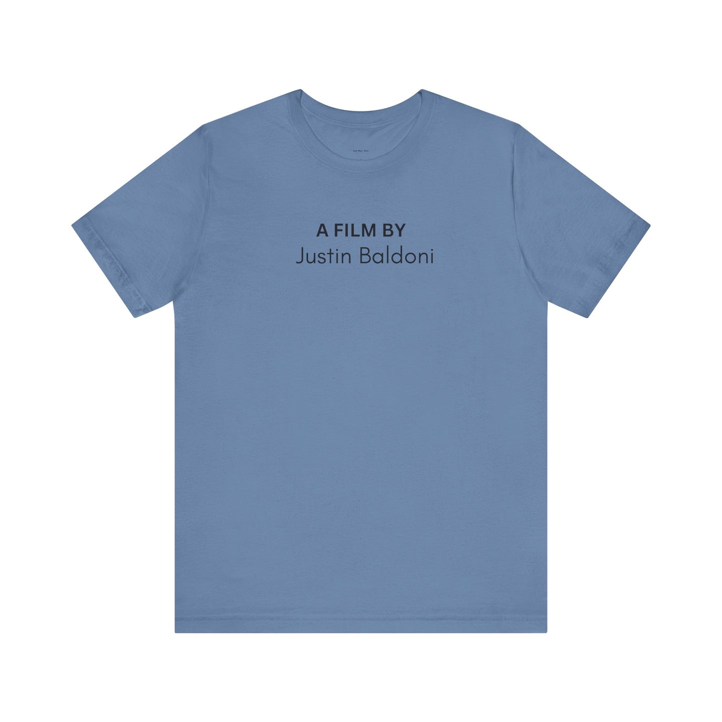 Blue t-shirt with text 'A Film By Justin Baldoni'  