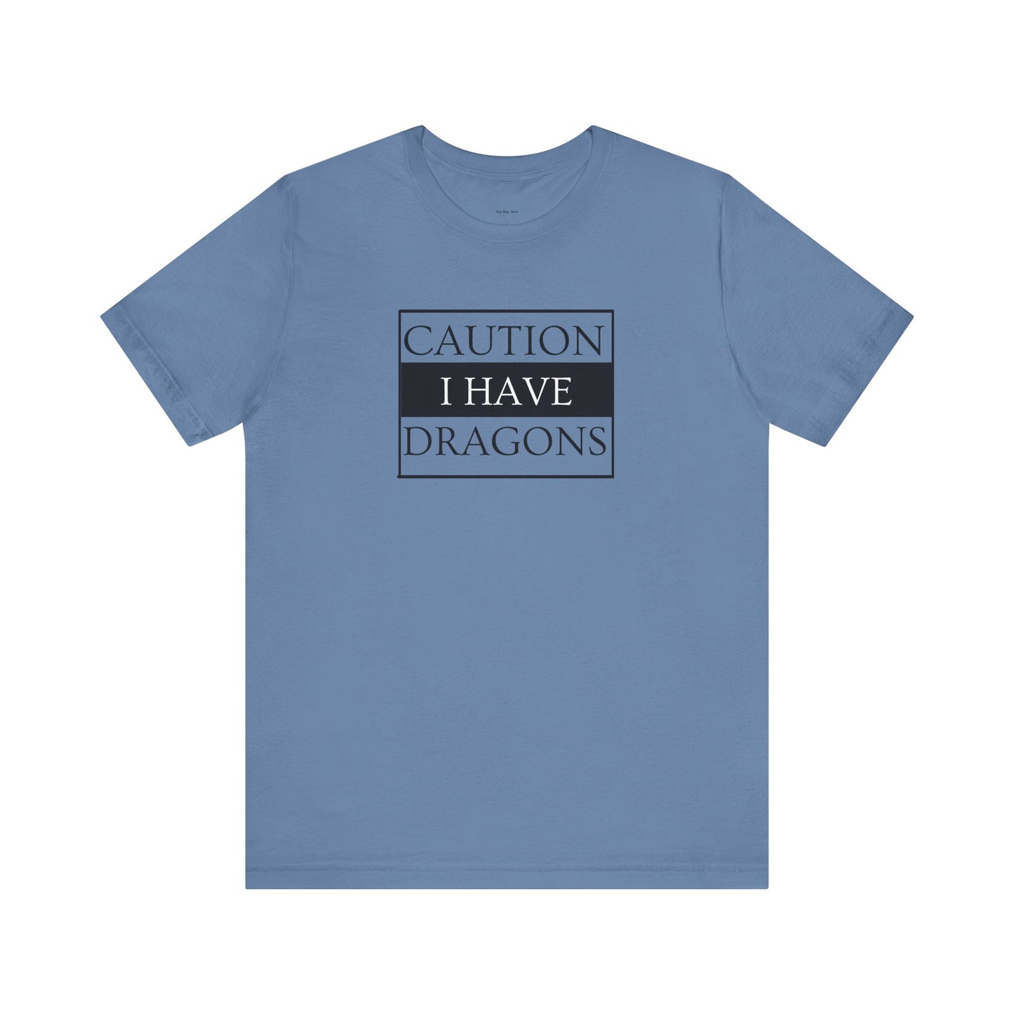 Blue t-shirt with 'Caution I Have Dragons' text  