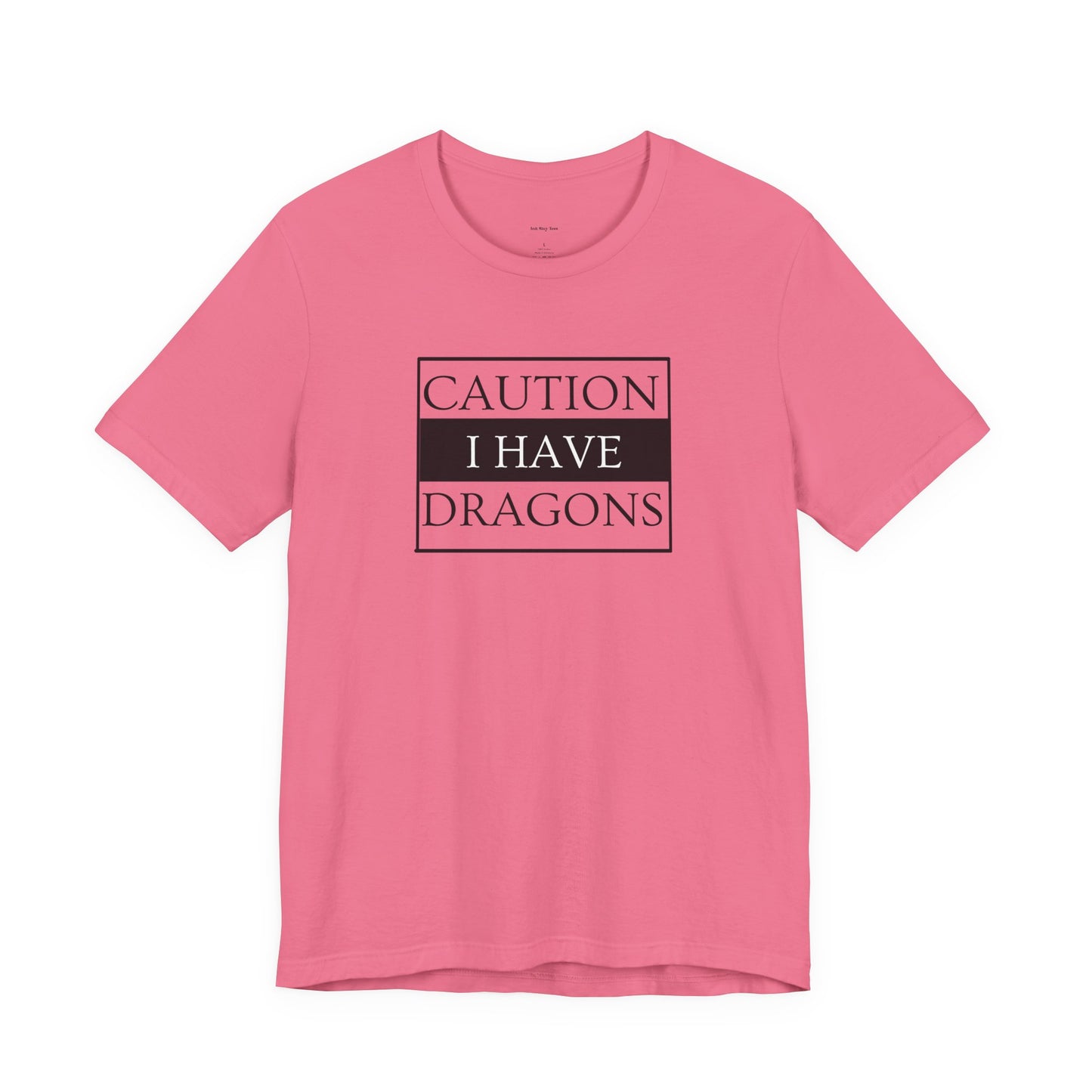 Pink t-shirt with 'Caution I Have Dragons' text  